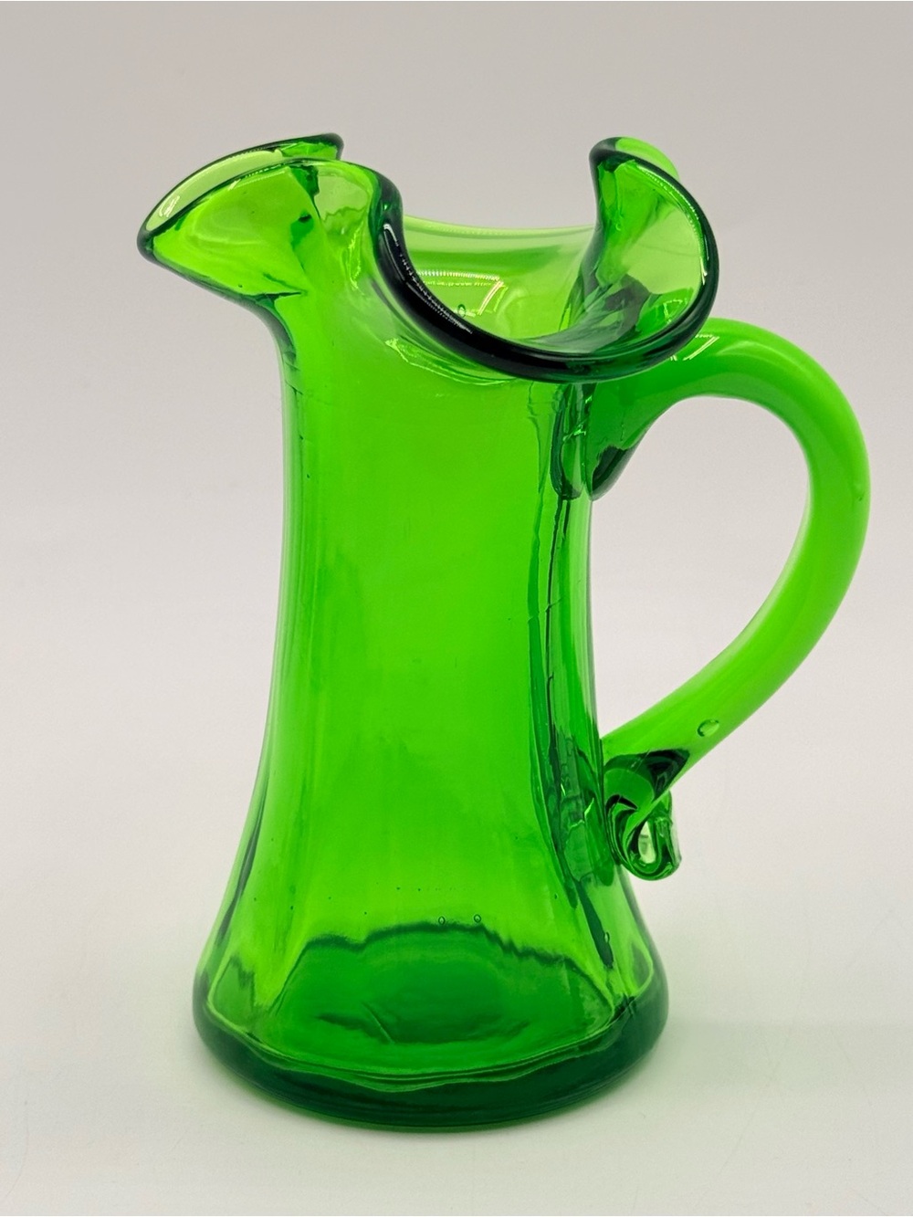 Vintage Hand Blown Green Art Glass Creamer Pitcher Ruffled Rim Applied Handle